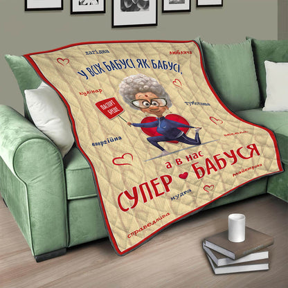 Бежевий стьобаний плед для бабусі